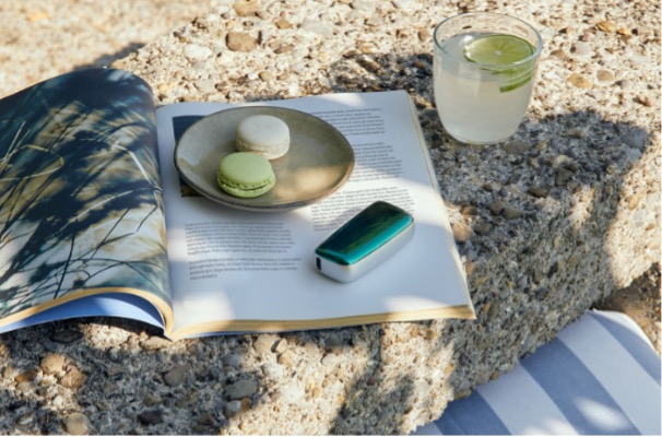 Ia cu tine plăcerea oriunde mergi, prin rezervele cu tutun încălzit și un dispozitiv unic