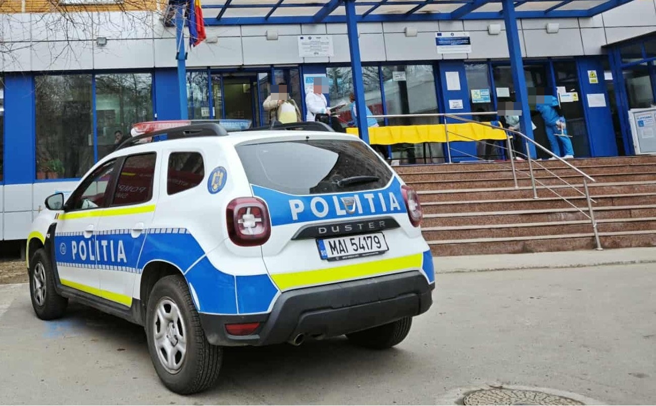 sofer scos din masina de politisti